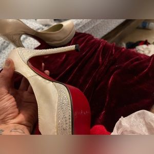 Red bottom silky white and bling studded.